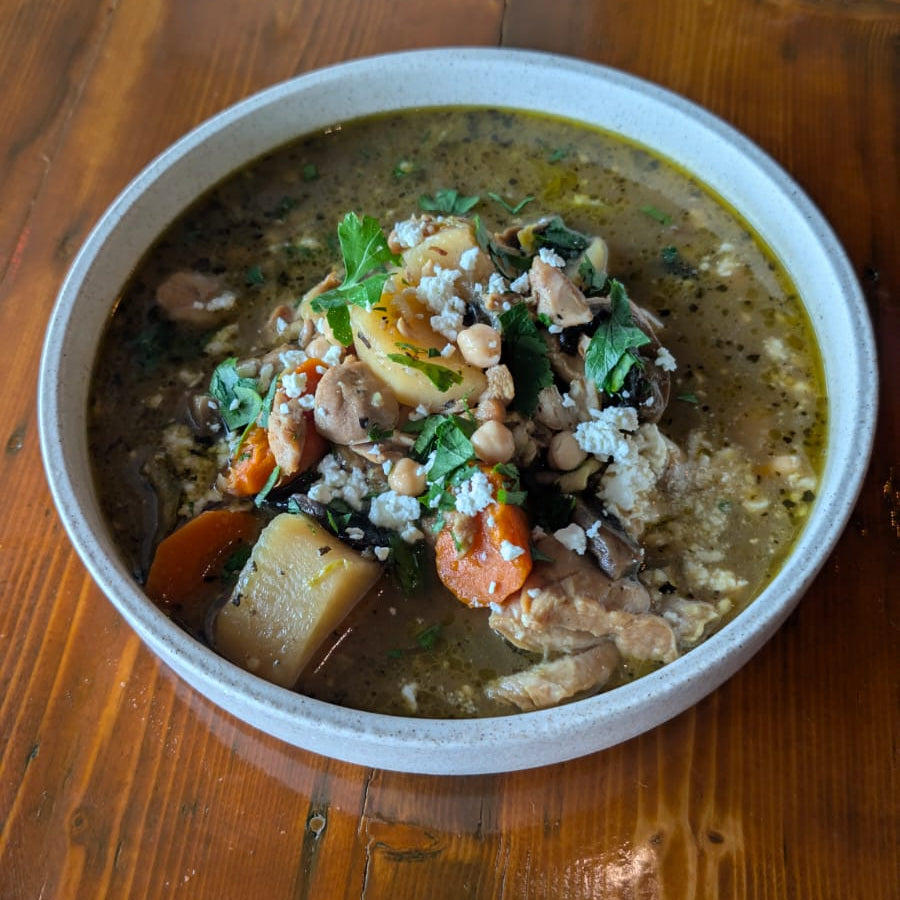 Greek chicken soup plated up in a bowl