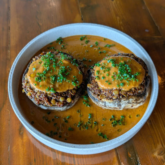 Bolognaise, lentil & quinoa stuffed mushrooms served with a roasted tomato sauce.